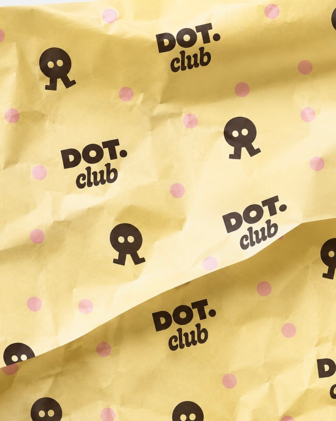 Papier d’emballage DOT.club, packaging branding rétro et premium